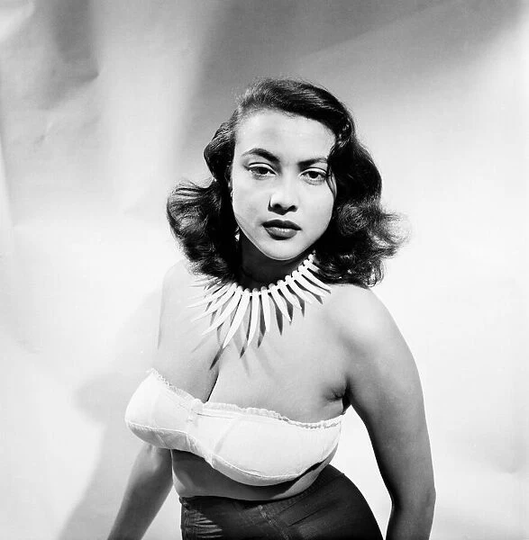 Film actress Tessa Prendergast a wearing a necklace. January 1953 D471-001