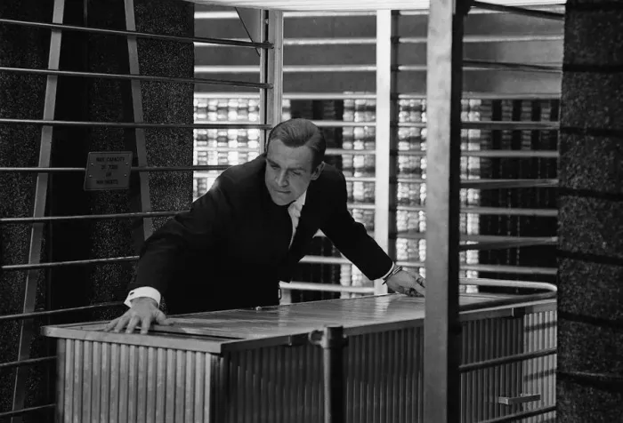 Framed Print : Film Goldfinger 1964 Sean Connery as James Bond 007 hand cuffed to a nuclear bomb in