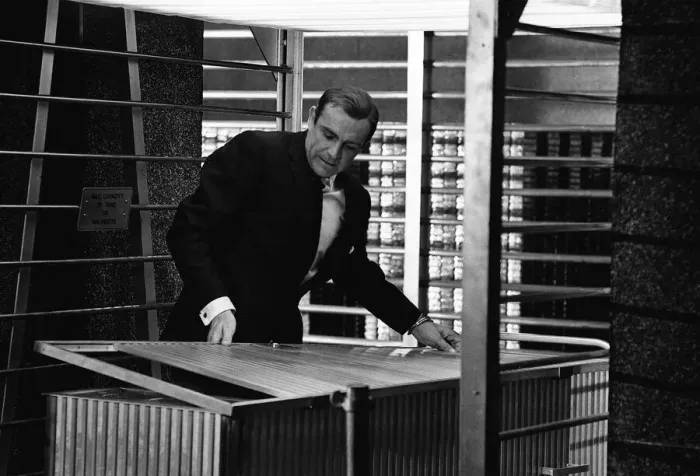 Framed Print : Film Goldfinger 1964 Sean Connery as James Bond 007 hand cuffed to a nuclear bomb in Framed Print : Film Goldfinger 1964 Sean Connery as James Bond 007 hand cuffed to a nuclear bomb in