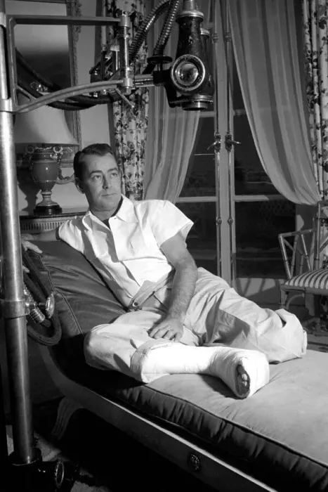 Framed Print : Film star Alan Ladd, who has injured his foot. October 1953 D6473-002 Framed Print : Film star Alan Ladd, who has injured his foot. October 1953 D6473-002