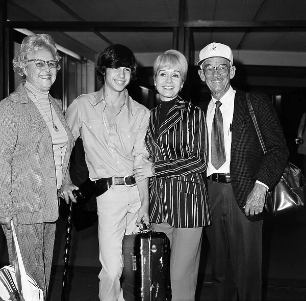 Film star Debbie Reynolds arrives at Heathrow Airport. with her son Todd Fisher