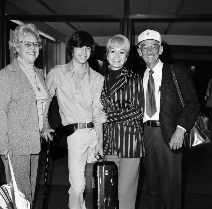 Framed Print : Film star Debbie Reynolds arrives at Heathrow Airport. with her son Todd Fisher Framed Print : Film star Debbie Reynolds arrives at Heathrow Airport. with her son Todd Fisher
