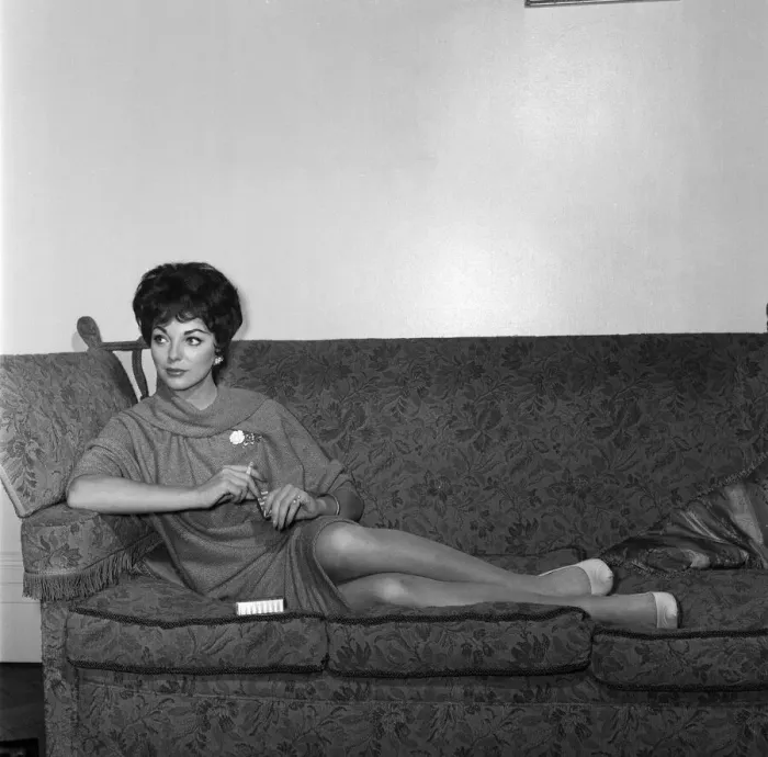 Framed Print : Film star Joan Collins flew into London today from Montego Bay