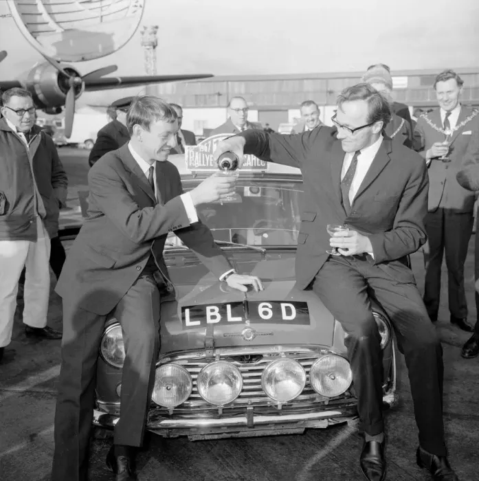 Framed Print : Finnish rally driver Rauno Aaltonen with his winning Monte Carlo rally Mini car Framed Print : Finnish rally driver Rauno Aaltonen with his winning Monte Carlo rally Mini car