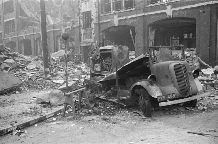 Framed Print : Fire appliances, hoses and ladders buried under debris at Carreras Tobacco Company