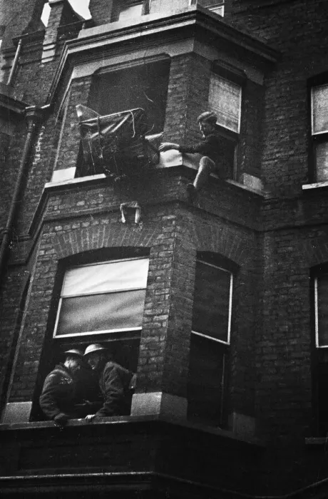Framed Print : Fire crews, police and ARP wardens help salvage furniture from properties close to