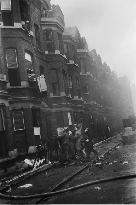 Framed Print : Fire crews, police and ARP wardens help salvage furniture from properties close to
