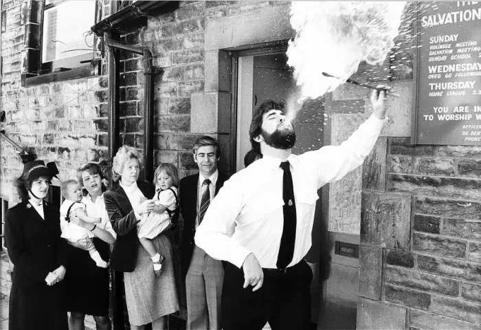 Framed Print : Fire-eater Salvation Army Lt Iain Martin June 1985 demonstrates his talents as a Framed Print : Fire-eater Salvation Army Lt Iain Martin June 1985 demonstrates his talents as a