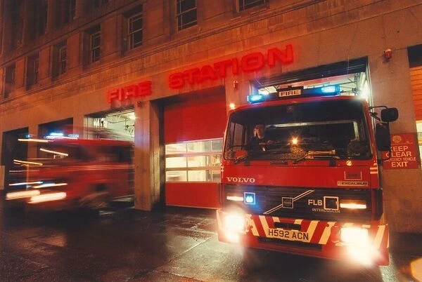 Fire engines rush out of Pilgrim Street fire station in Newcastle on an emergency call