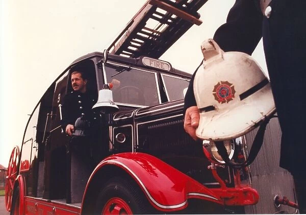 Firefighters Alistair Adam (moustache) and Paul Craggs have restored a 1937 Leyland fire
