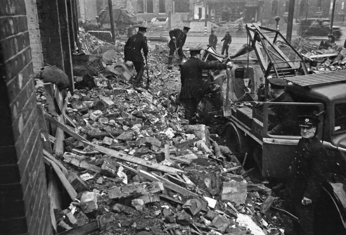 Framed Print : Firefighters clear fire appliances, hoses and ladders buried under debris at Carreras Framed Print : Firefighters clear fire appliances, hoses and ladders buried under debris at Carreras
