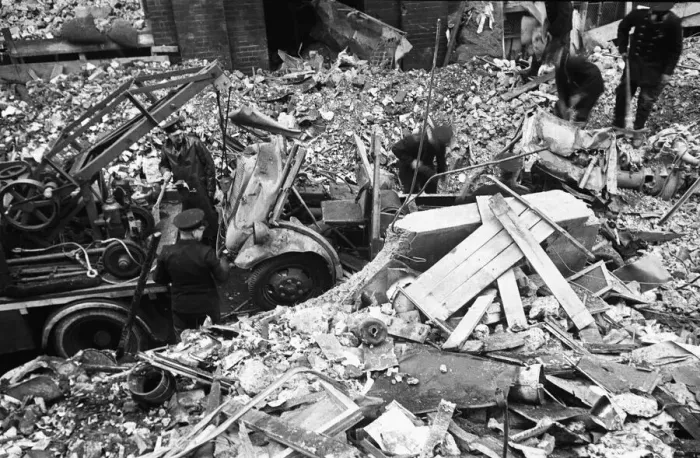 Framed Print : Firefighters clear fire appliances, hoses and ladders buried under debris at Carreras Framed Print : Firefighters clear fire appliances, hoses and ladders buried under debris at Carreras