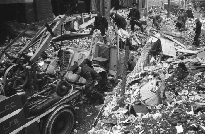Framed Print : Firefighters clear fire appliances, hoses and ladders buried under debris at Carreras Framed Print : Firefighters clear fire appliances, hoses and ladders buried under debris at Carreras