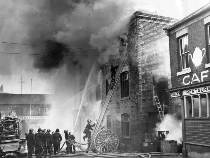 Framed Print : Firefighters fight to contain the fire in a three-storey chemical warehouse at Bridge