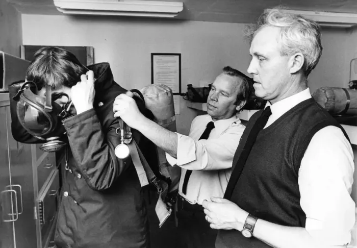 Framed Print : Firefighters Roy Wilson (centre), Harry Phillips handing out advice to Jim Milne about Framed Print : Firefighters Roy Wilson (centre), Harry Phillips handing out advice to Jim Milne about