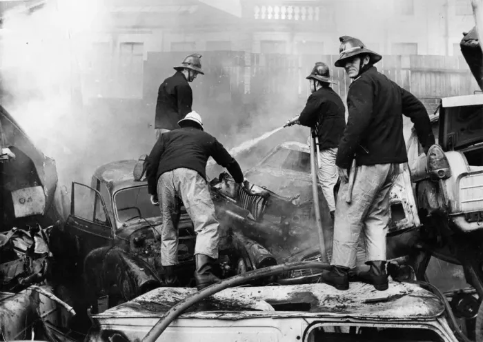 Framed Print : Firefighters scrambled about on piles of old cards to tackle a fire at Benfield Vehicle Framed Print : Firefighters scrambled about on piles of old cards to tackle a fire at Benfield Vehicle