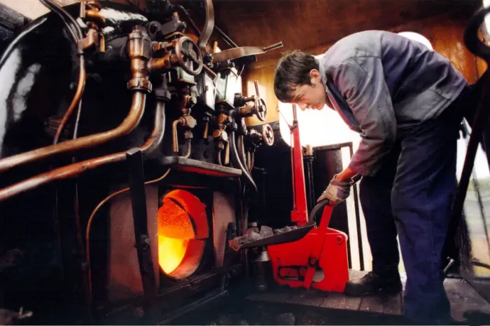 Framed Print : Fireman Andrew Arnold, stokes up the Tanfield Rambler on 28th August 1997 Framed Print : Fireman Andrew Arnold, stokes up the Tanfield Rambler on 28th August 1997