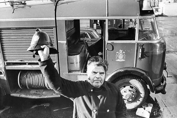 Fireman Jack Bruce takes his hat off to the five fire engines which have given sterling