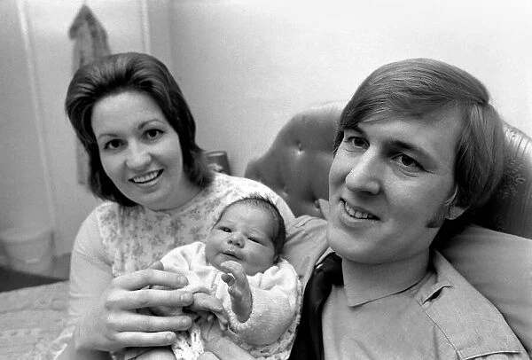 Fireman Sandy Durnall and Mrs Ann Murray and baby David John. January 1975 75-00152