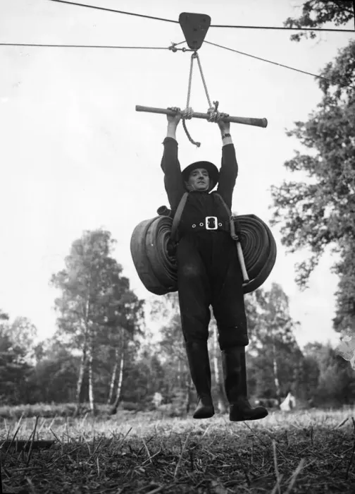 Framed Print : Fireman training commando style. World War Two. Picture taken 7th