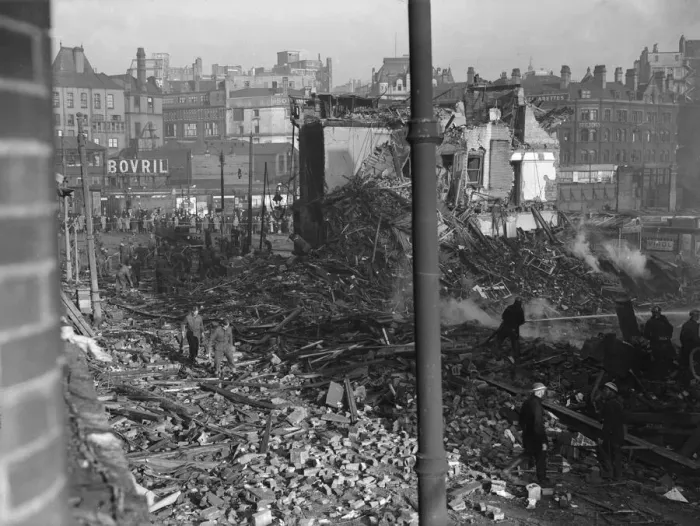 Framed Print : Firemen dampen down and rescue squads search the shattered remains of John Bright Street Framed Print : Firemen dampen down and rescue squads search the shattered remains of John Bright Street