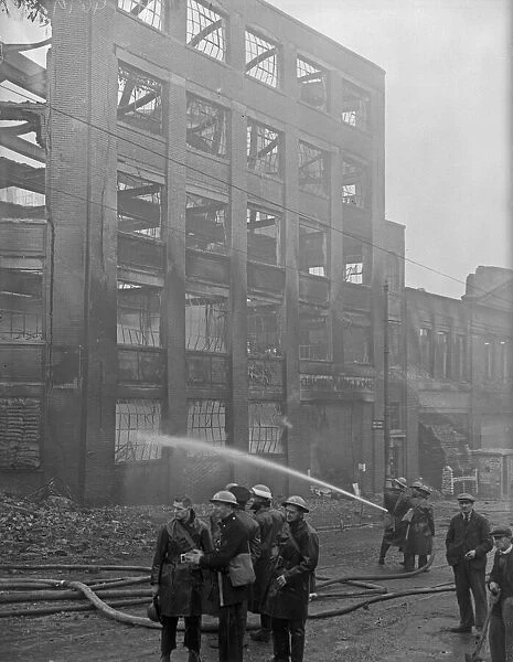 Firemen dampening down the Chamberlain, Kind and Jones factory, Holl0way Head