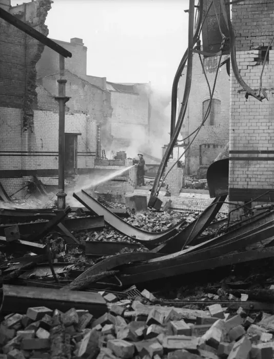 Framed Print : Firemen dampening down the CWS shop and offices in Pershore Street, Birmingham