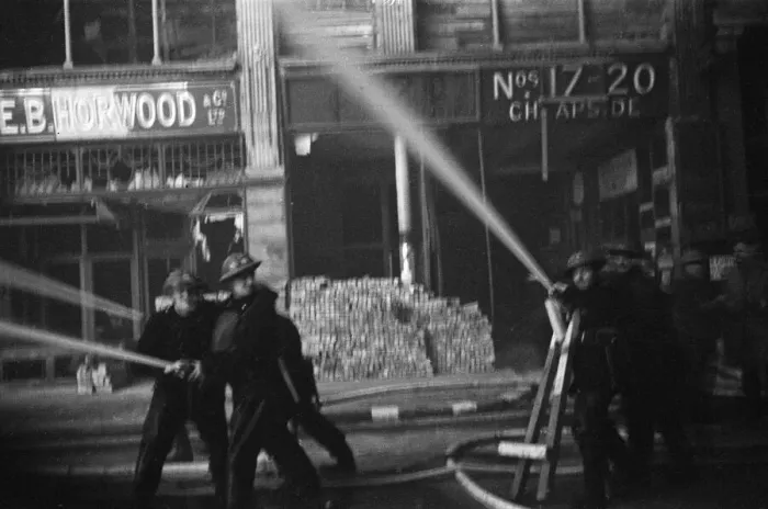 Framed Print : Firemen fighting fires in Cheapside, London, started by incendiary bombs dropped in their