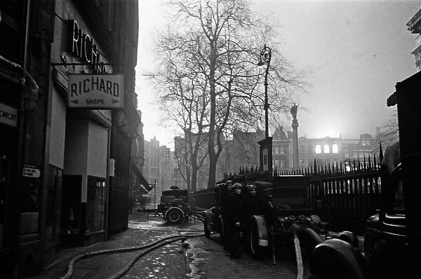 Firemen and pumps in St Pauls Cathedral church yard, London