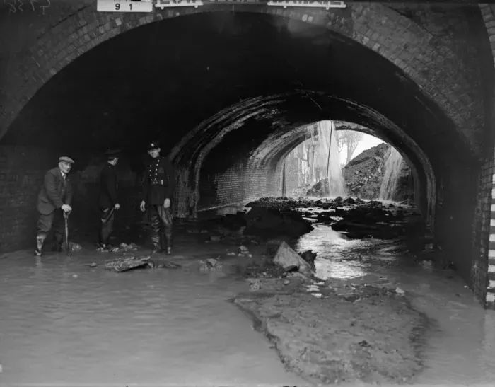 Framed Print : Firemen and rescue worker survey the scene after a direct hit on the Birmingham to Framed Print : Firemen and rescue worker survey the scene after a direct hit on the Birmingham to