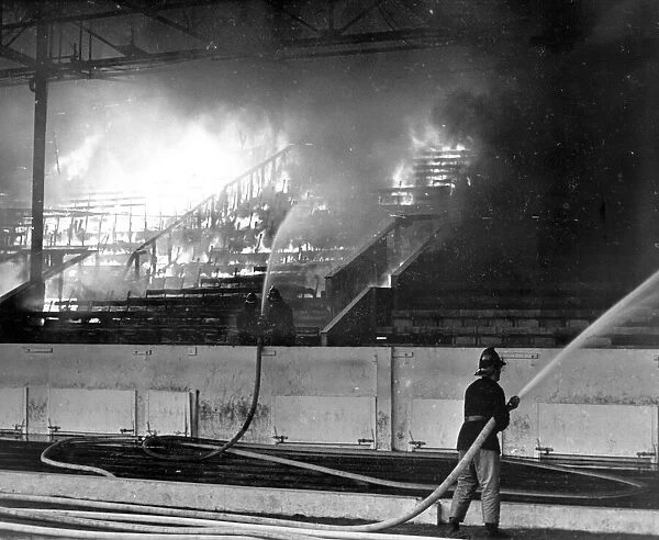 Firemen tackle a blaze at Coventry City Football Stadium, Highfield Road