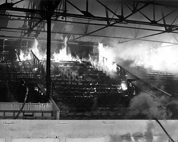 Firemen tackle a blaze at Coventry City Football Stadium, Highfield Road