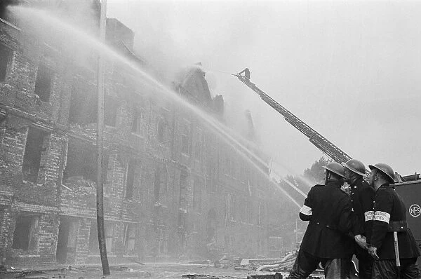 Firemen tackling a blaze, Circa 1940