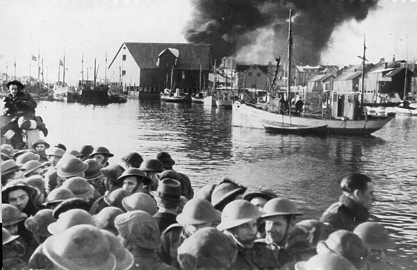 Fires burning in Stamsund on the Lofoten Islands as British commandos leave
