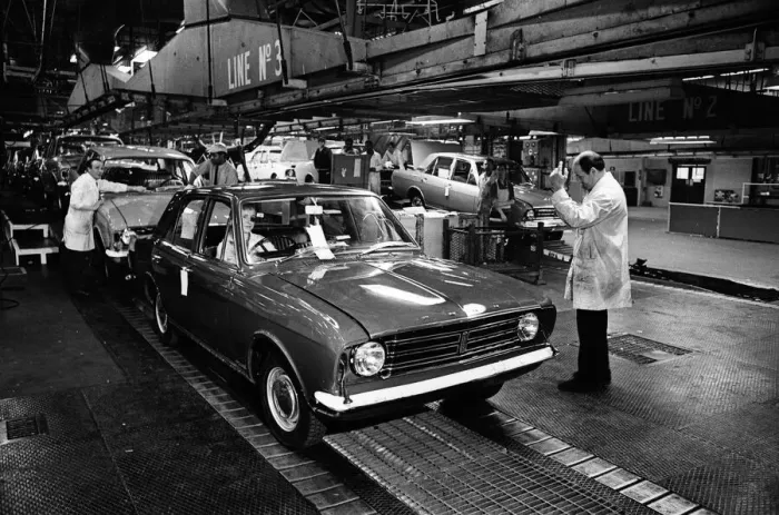 Framed Print : The first car on the production line at Ford motor plant in Dagenham following the strike Framed Print : The first car on the production line at Ford motor plant in Dagenham following the strike