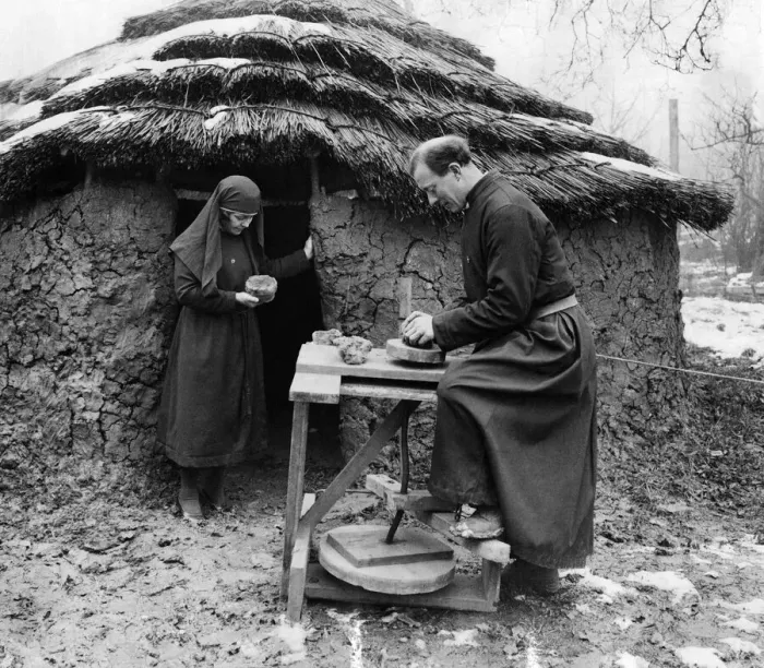 Framed Print : First Folk Park. Outside an early iron age hut in the village Framed Print : First Folk Park. Outside an early iron age hut in the village