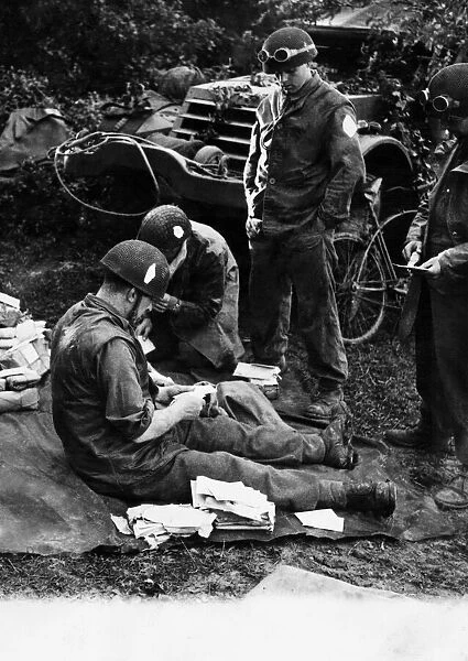 The first mail from home arrives for the men fighting in France