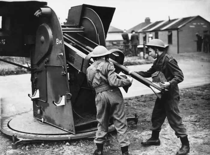 Framed Print : First pictures of the Home Guard A. A in action loading a projector. 8th July 1942 Framed Print : First pictures of the Home Guard A. A in action loading a projector. 8th July 1942