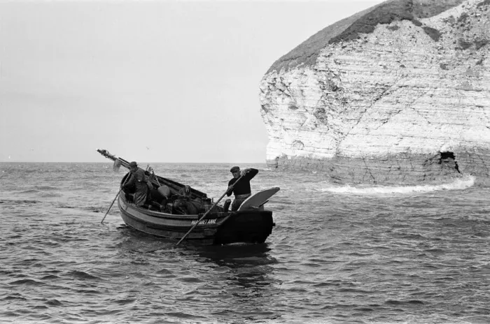 Framed Print : Fisherman George Emmerson with his devoted dog Sandy, pictured at work in Flamborough