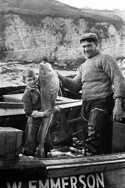Fisherman George Emmerson pictured at work in Flamborough. 30th October 1960