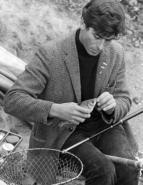 Fisherman Ray Mumford seen here with his catch. 26th October 1967