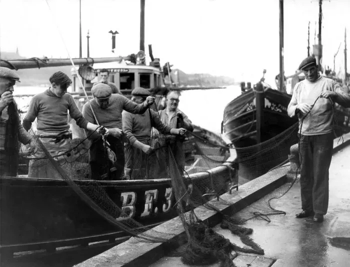 Framed Print : Fishermen of the Scottish herring boat Loranthus sort out their torn nets on North Framed Print : Fishermen of the Scottish herring boat Loranthus sort out their torn nets on North