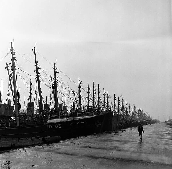 Fishing feature in Grimsby, Lincolnshire. Trawlers strike bound in the dock