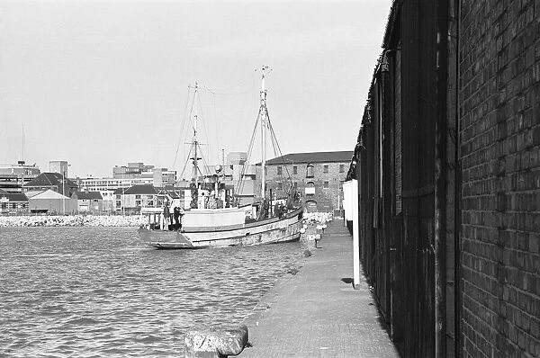The fishing vessel William McCann seen here mooring in a deserted Humber Dock Marina