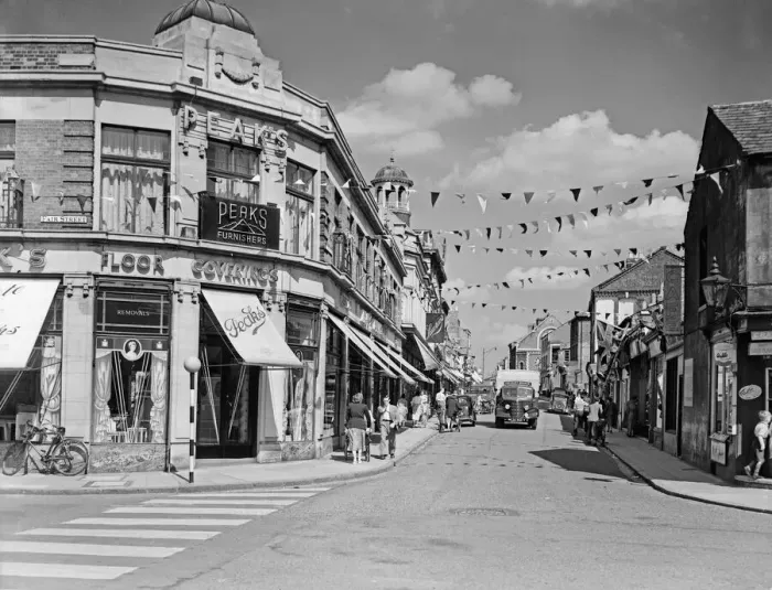Framed Print : Flags fluttering in the breeze, decorations in traditional colours lining the streets