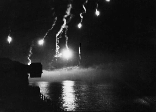 Flares light up Naples harbour. Friday 12th May 1944