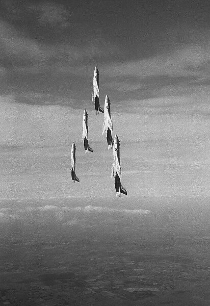 Fleet Air Arm Scimitars go vertical as they climb into a loop in formation during