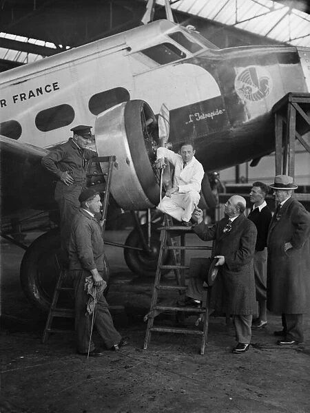Flight engineers working on the engines of the Air France L Intrepide Wibault 280