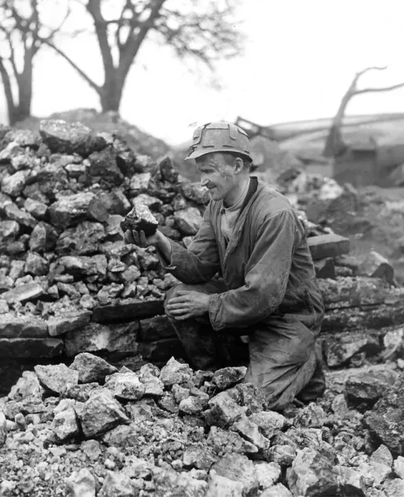 Framed Print : This is fluorspar being examined by mr. Eric Richardson at the Coalclough Lead Mine in Framed Print : This is fluorspar being examined by mr. Eric Richardson at the Coalclough Lead Mine in