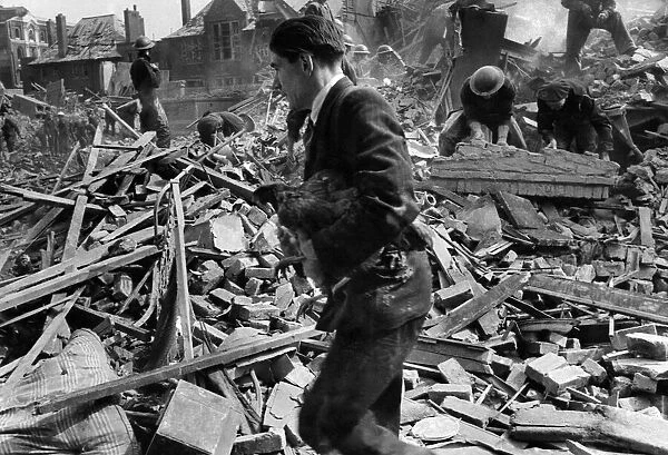 Flying bomb incident at Buxton and Underwood Street, in London showing demolished houses